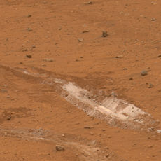 Silica is present in Martian soil that the Spirit Rover unintentionally turned up.